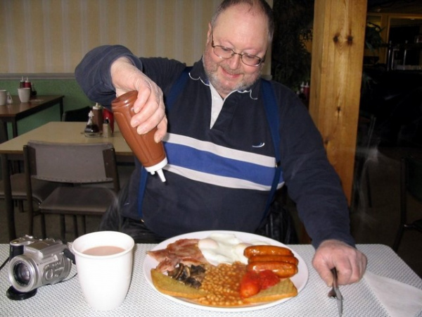 Zoom in Bob enjoying a Fromes Hill Cafe Full English Breakfast
