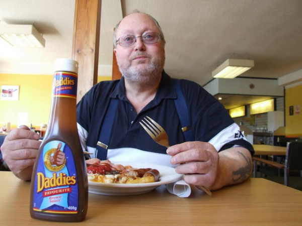 Zoom in Bob enjoying a Fromes Hill cafe breakfast