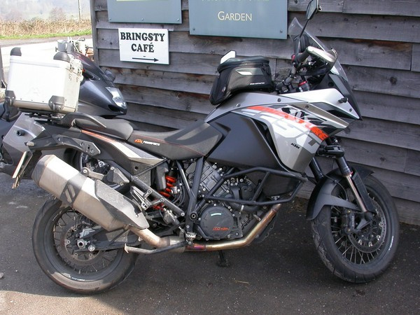 Zoom in Steve's KTM 1190 Adventure outside Bringsty cafe