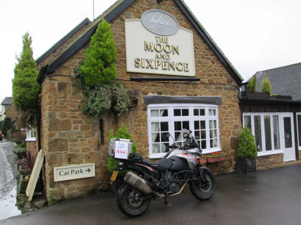 Zoom in KTM 1190 Adventure outside the Moon and Sixpence pub